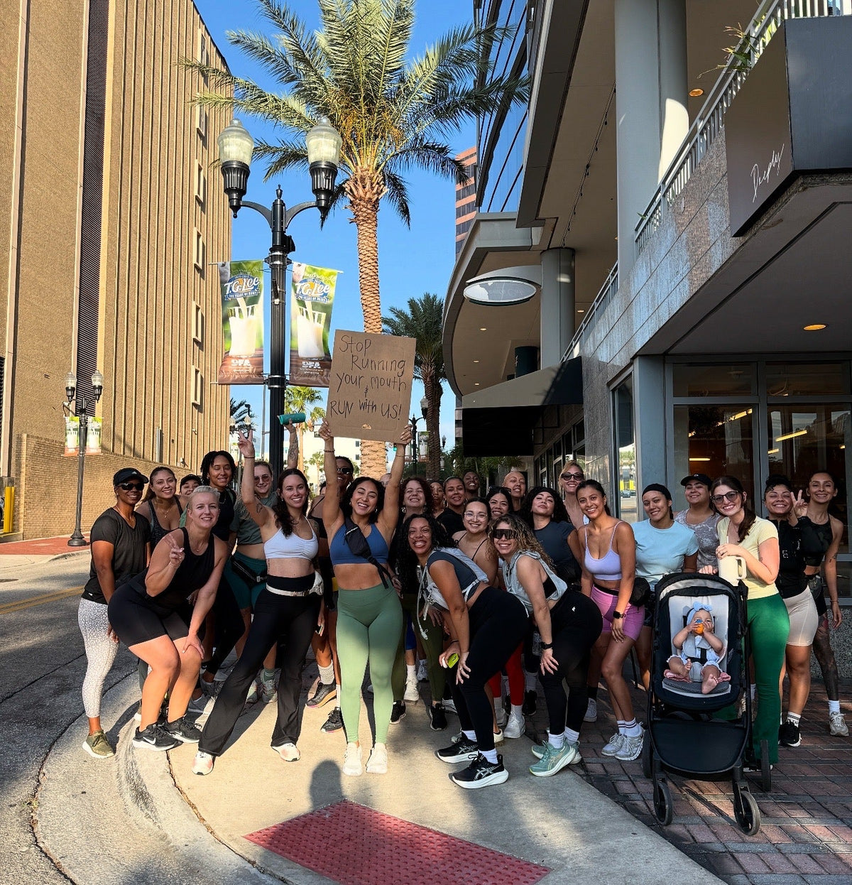 Group of ROCFIT women working out together, smiling in ROCFITWORLD activewear