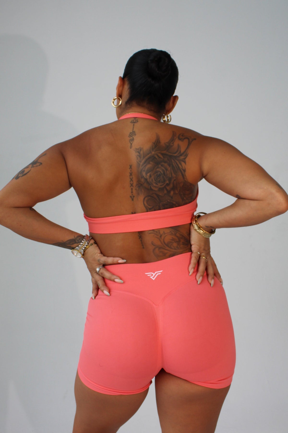 close-up shot of a woman's midsection and waist as she wears supportive athletic activewear during a fitness training session.